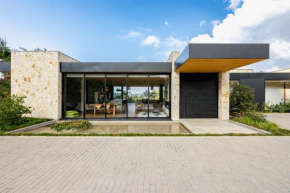 Villa al lado de la represa de Guatapé con jacuzzi y cancha de tennis privada
